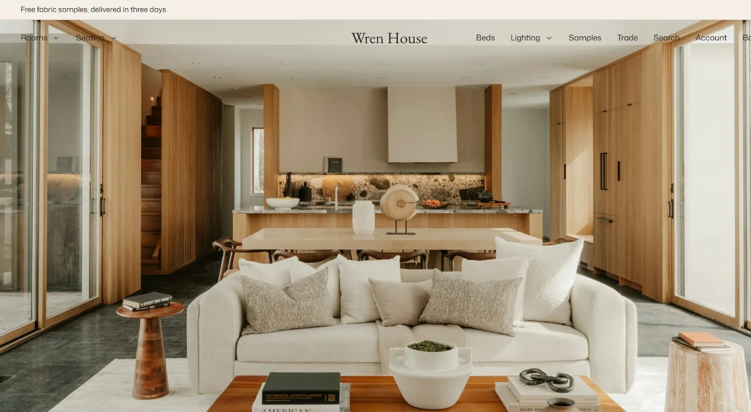 The Wren House home page in the Parlor style, on a laptop